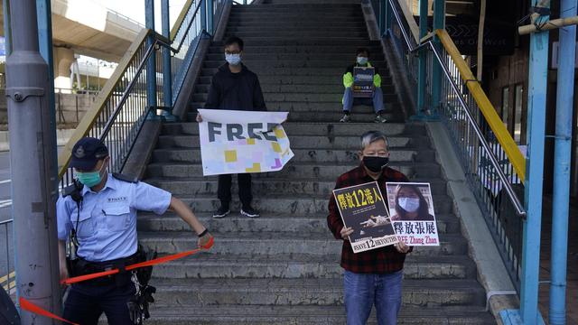 Une "journaliste citoyenne" qui avait couvert l'épidémie de Covid-19 à Wuhan a été condamnée, lundi, à quatre ans de prison. [AP Photo/Kin Cheung]