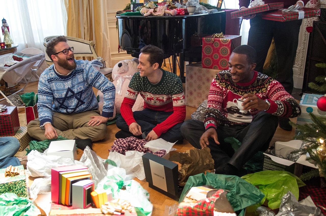 Seth Rogen, Joseph Gordon-Levitt, Anthony Mackie dans le film "La veille" en 2015. [AFP - Columbia Pictures]