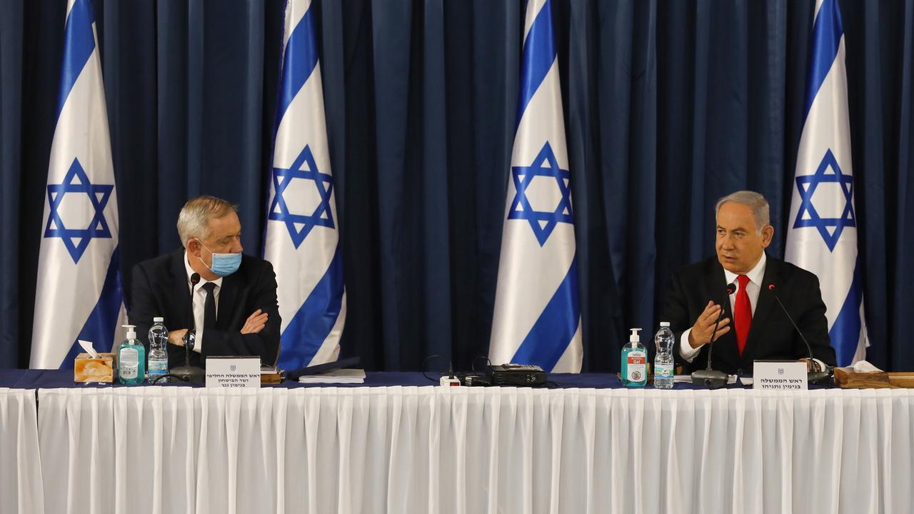 Le ministre de la Défense Benny Gantz et le Premier ministre Benjamin Netanyahu en juin dernier. [Keystone - EPA/Menahem Kahana]