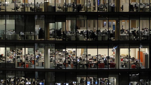 Les bureaux dans un immeuble de la City, à Londres. [Keystone - AP Photo/Matt Dunham]