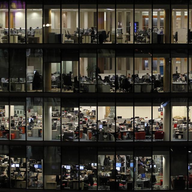 Les bureaux dans un immeuble de la City, à Londres. [Keystone - AP Photo/Matt Dunham]