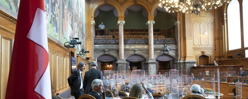 Covid: les chambres de l'Assemblée fédérale se sont mises d'accord sur l'aide aux patrons indépendants. [keystone - peter klaunzer]