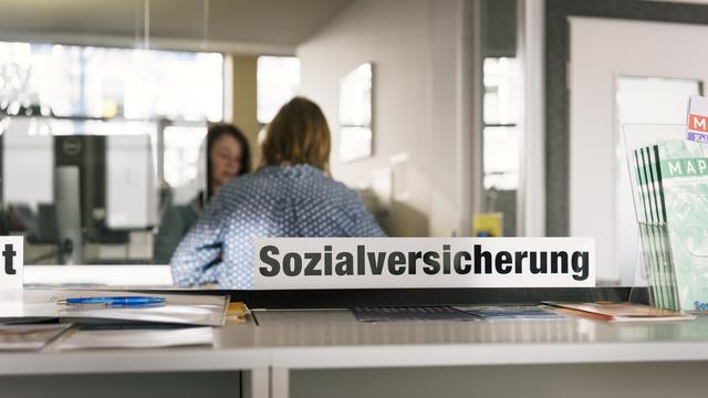 Un bureau de l'aide sociale à Zurich. [Keystone - Christian Beutler]