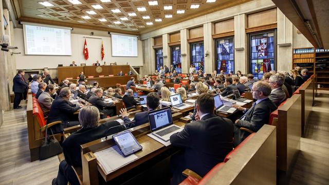 Les députés du Grand conseil genevois devront peut-être faire preuve de plus de transparence. [Keystone - Salvatore Di Nolfi]