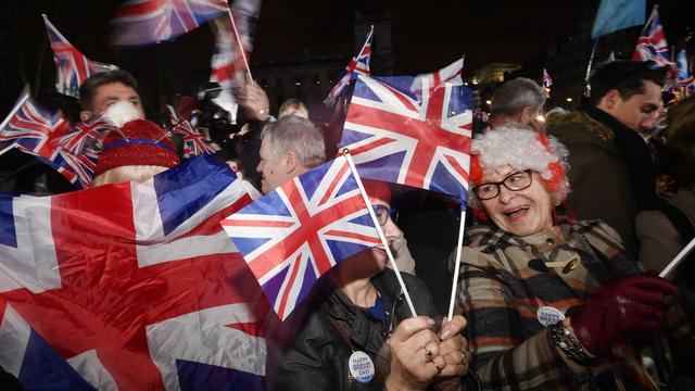 Des partisans du Brexit au moment de la sortie du Royaume-Uni de l'UE. [Keystone - EPA/Neil Hall]