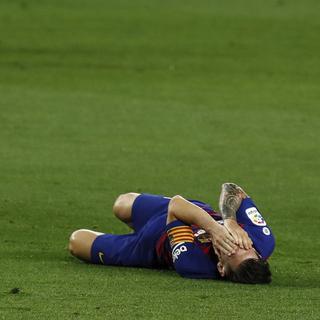 Lionel Messi pendant le match entre RCD Espanyol et Real Madrid. [Keystone - AP Photo/Joan Monfort]