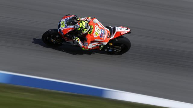 Andrea Iannone a fauté. Il est puni. [AP - Michael Conroy]