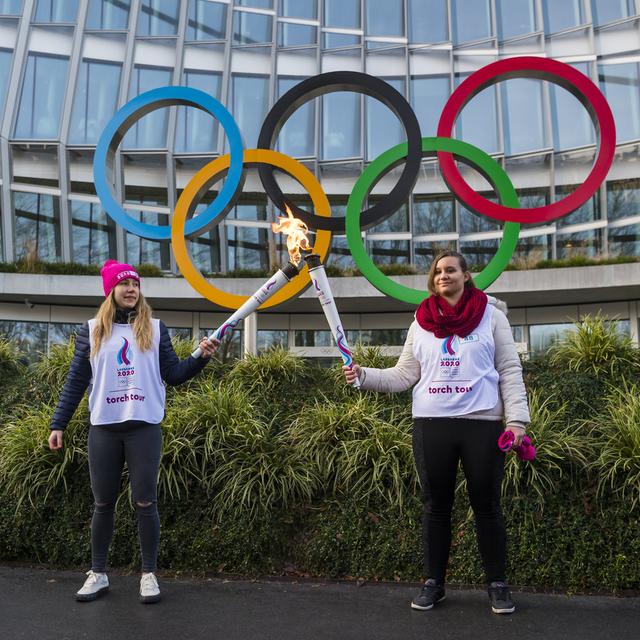 La flamme olympique est arrivée devant le siège du CIO avant l'ouverture des JOJ le 9 janvier. [Jean-Christophe Bott]