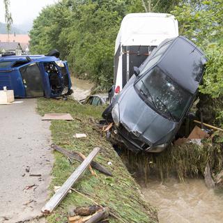 Le 21 juin de l'année passée, des inondations avaient provoqué des dégâts impressionnants dans le Val-de-Ruz. [KEYSTONE - Laurent Gillieron]
