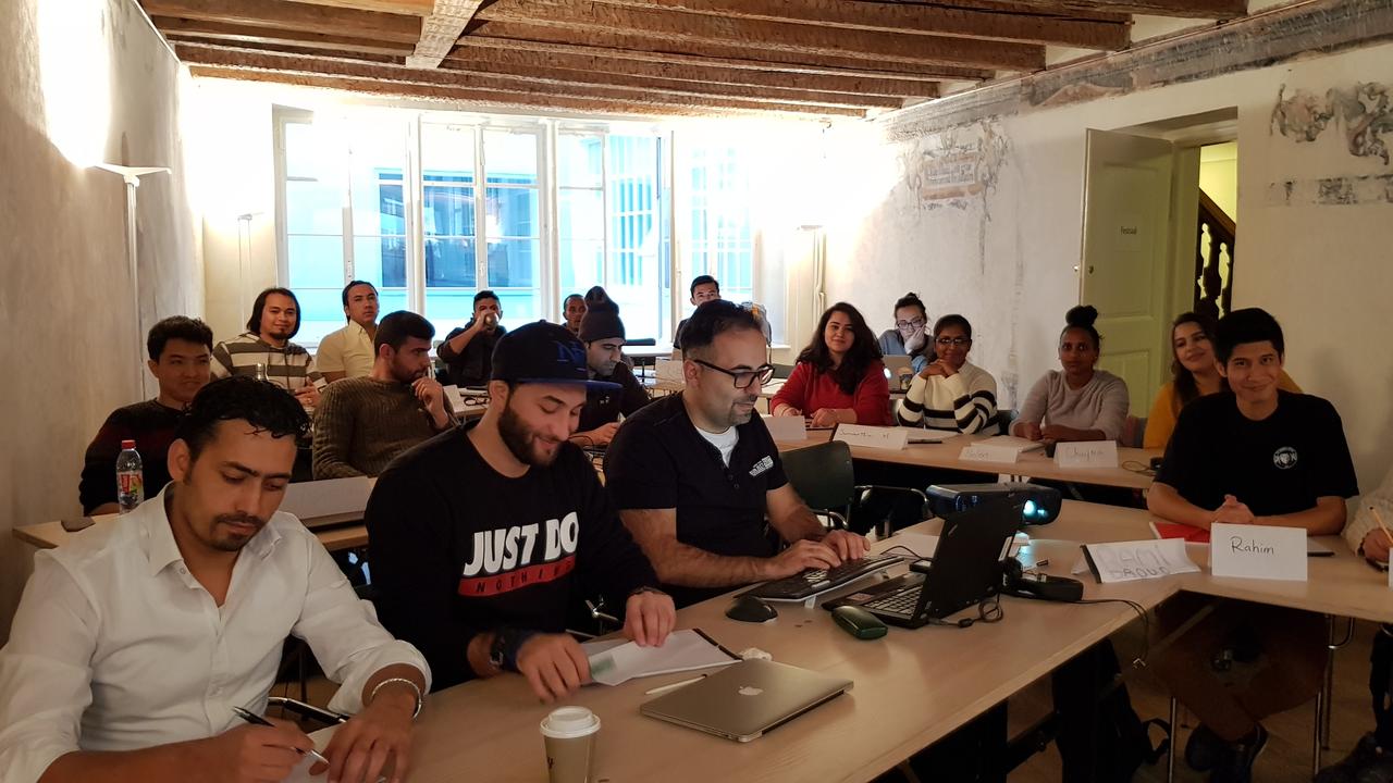 Une classe du programme de formation Powercoders, en 2018 à Bâle. [Powercoders]