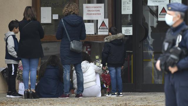 Neuf personnes en garde à vue après la décapitation d'un enseignant en France [AFP - Bertrand Guay]