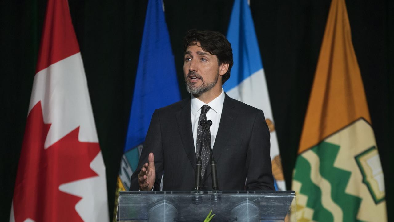 Justin Trudeau, lors d'une cérémonie à la mémoire des victimes du crash, ce 12 janvier 2020 à Edmonton, au Canada. [Todd Korol - The Canadian Press via AP]