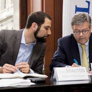 Philippe Miauton, président du PLR lausannois (à gauche), et Marc-Olivier Buffat. [Keystone - Jean-Christophe Bott]
