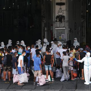 Les migrants qui débarquent en Italie sont soumis à une quarantaine à leur arrivée, mais beaucoup de Tunisiens tentent de s'y soustraire. [AFP - Dario Pignatelli]
