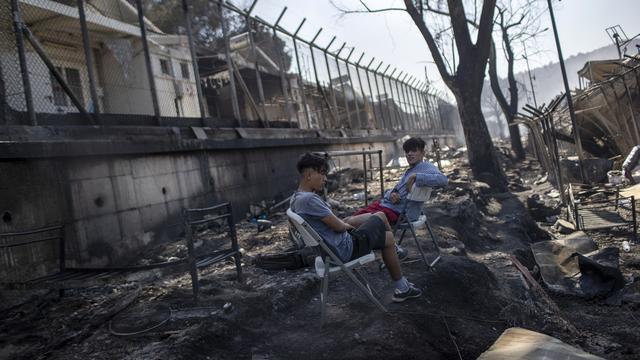 Les destructions sont très importantes dans le camp de réfugiés de Moria, ravagé par les flammes dans la nuit de mardi à mercredi. [Keystone - Petros Giannakouris]