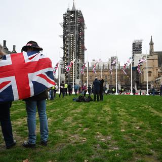 Vendredi 31 janvier: les partisans du Brexit se réunissent devant le Parlement britannique à Londres. [Keystone - EPA/Neil Hall]