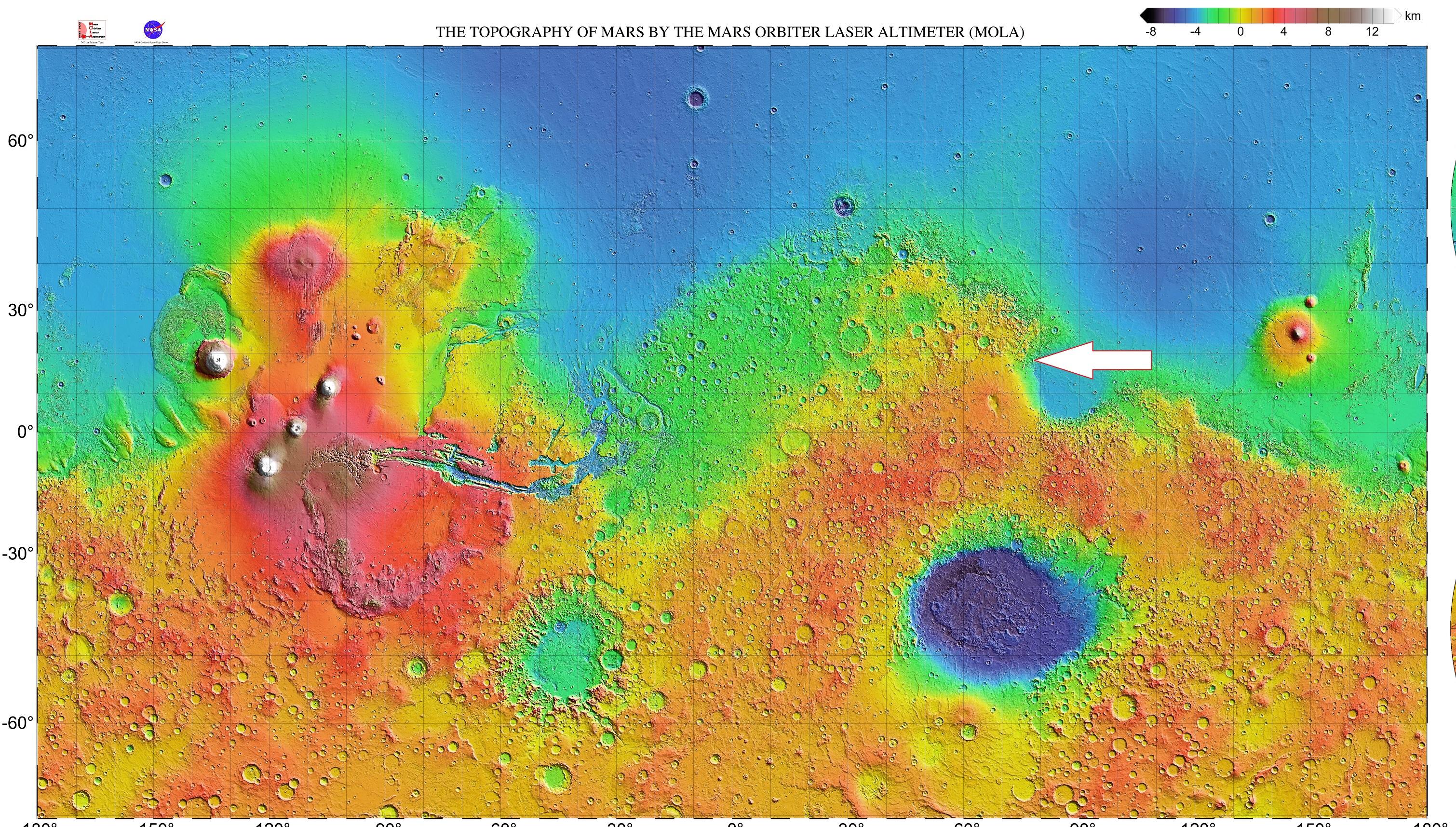 La sonde qui emmène le rover Perseverance devrait atterrir dans le cratère Jezero (flèche blanche), au nord-ouest du bassin d'impact d'Isidis Planitia [Domaine public - NASA / JPL / USGS]