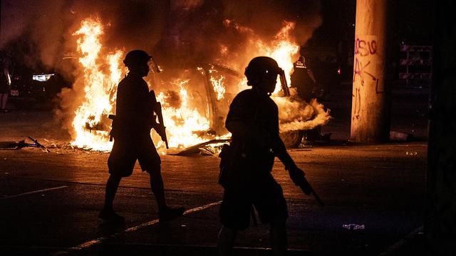 Des émeutes se sont déroulées un peu partout aux Etats-Unis, ici à Austin. [Keystone - Ricardo B. Brazziell/Austin American-Statesman via AP]