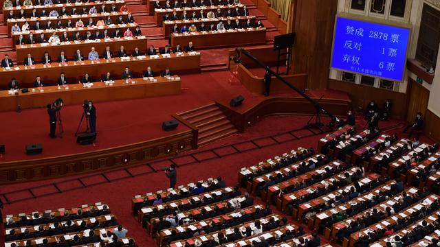 Le parlement chinois adopte sa mesure controversée sur Hong Kong. [AFP - Nicolas Asfouri]