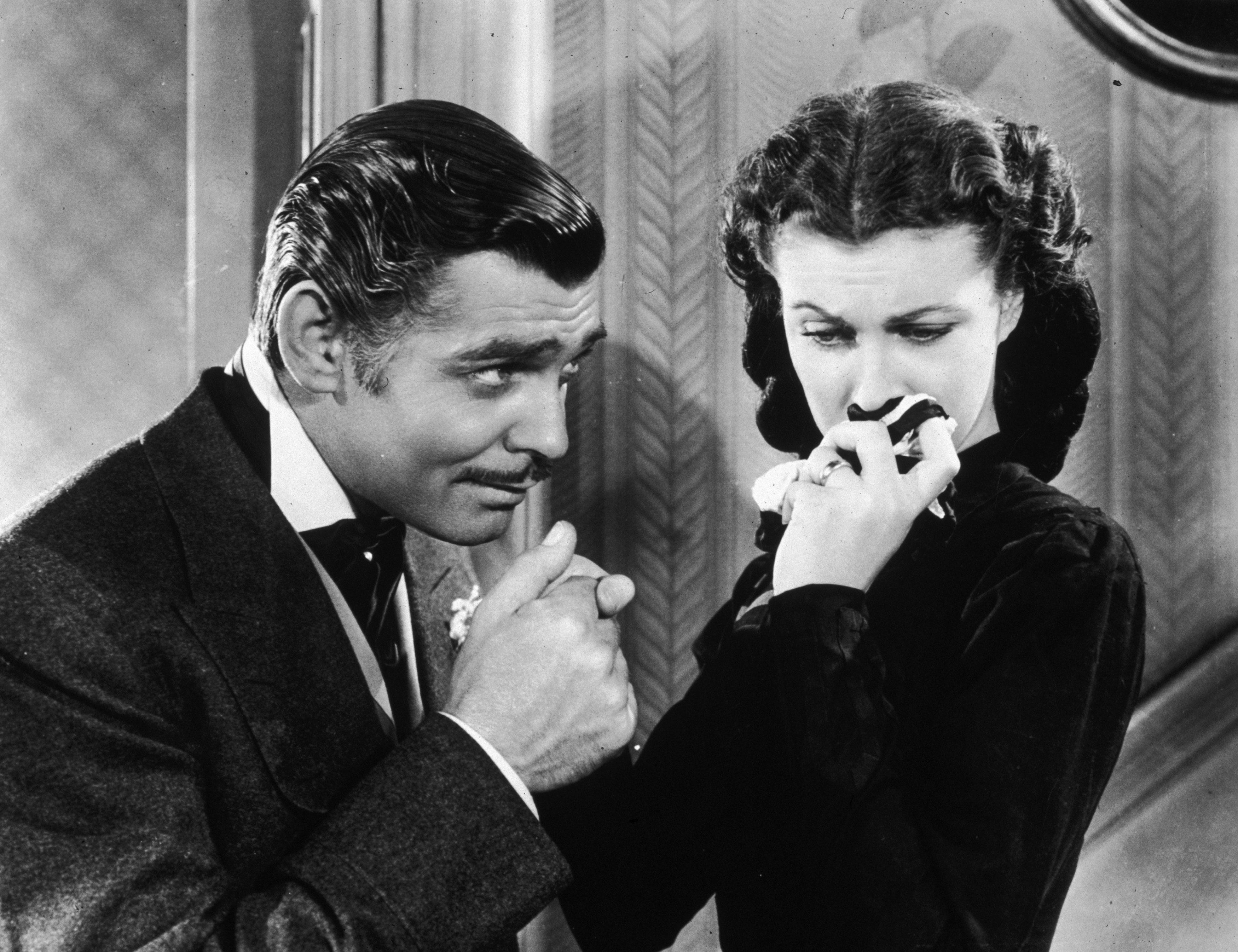 L'acteur Clark Gable dans le rôle de Rhett Butler et Vivien Leigh qui joue Scarlett O'Hara dans le film "Autant en emporte le vent". [Archive /Getty Images]