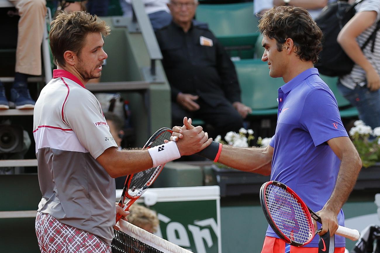 Roger Federer s'incline devant un Stan Wawrinka tellement plus fort. [EPA - Yoan Valat]