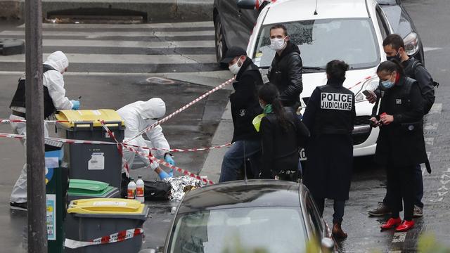 La police scientifique sur les lieux de l'attaque. [Keystone - AP Photo/Thibault Camus]