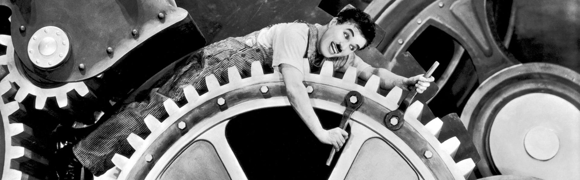 Charlie Chaplin dans "Les Temps modernes". [AFP - CHARLES CHAPLIN PRODUCTIONS / COLLECTION CHRISTOPHEL]