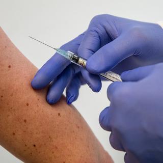 Les annonces se succèdent concernant un potentiel vaccin au coronavirus. [DPA/Keystone - Christoph Schmidt]
