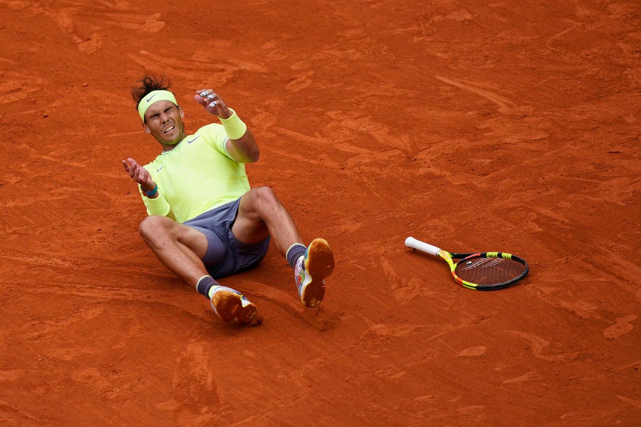 Rassure-vous: Rafael Nadal n'est pas blessé. L'Espagnol privilégie l'idée de s'entraîner pour s'écrouler une fois de plus en tant que patron sur la terre battue de Roland-Garros plutôt que de passer par New York. [AFP - Kenzo TRIBOUILLARD]