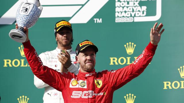 Même s'il pilote chez Ferrari depuis cinq ans, Sebastian Vettel a connu ses meilleures années chez Red Bull. [AP - Laszlo Balogh]