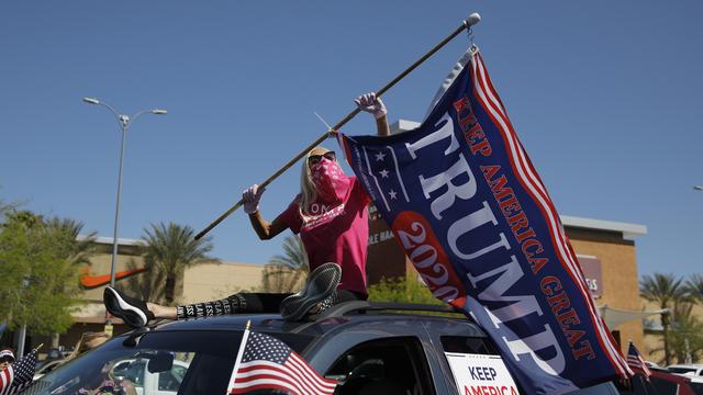 La campagne présidentielle reprend dans un pays divisé. [AP Photo/Keystone - John Locher]