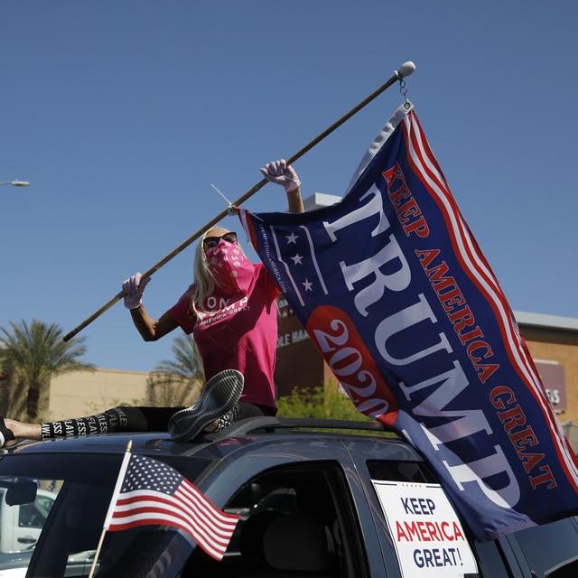 La campagne présidentielle reprend dans un pays divisé. [AP Photo/Keystone - John Locher]