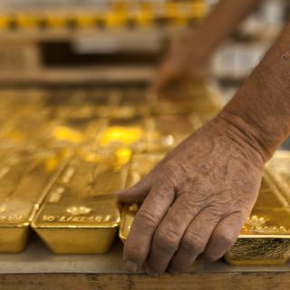 L'or atteint un record à 1930 dollars l'once. [Keystone - Martin Rütschi]