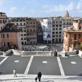 Les marches de la Piazza di Spagna de Rome sont presque vide... la capitale est sous quarantaine, comme toute l'Italie. [Keystone/Anadolu Agency - Baris Seckin]