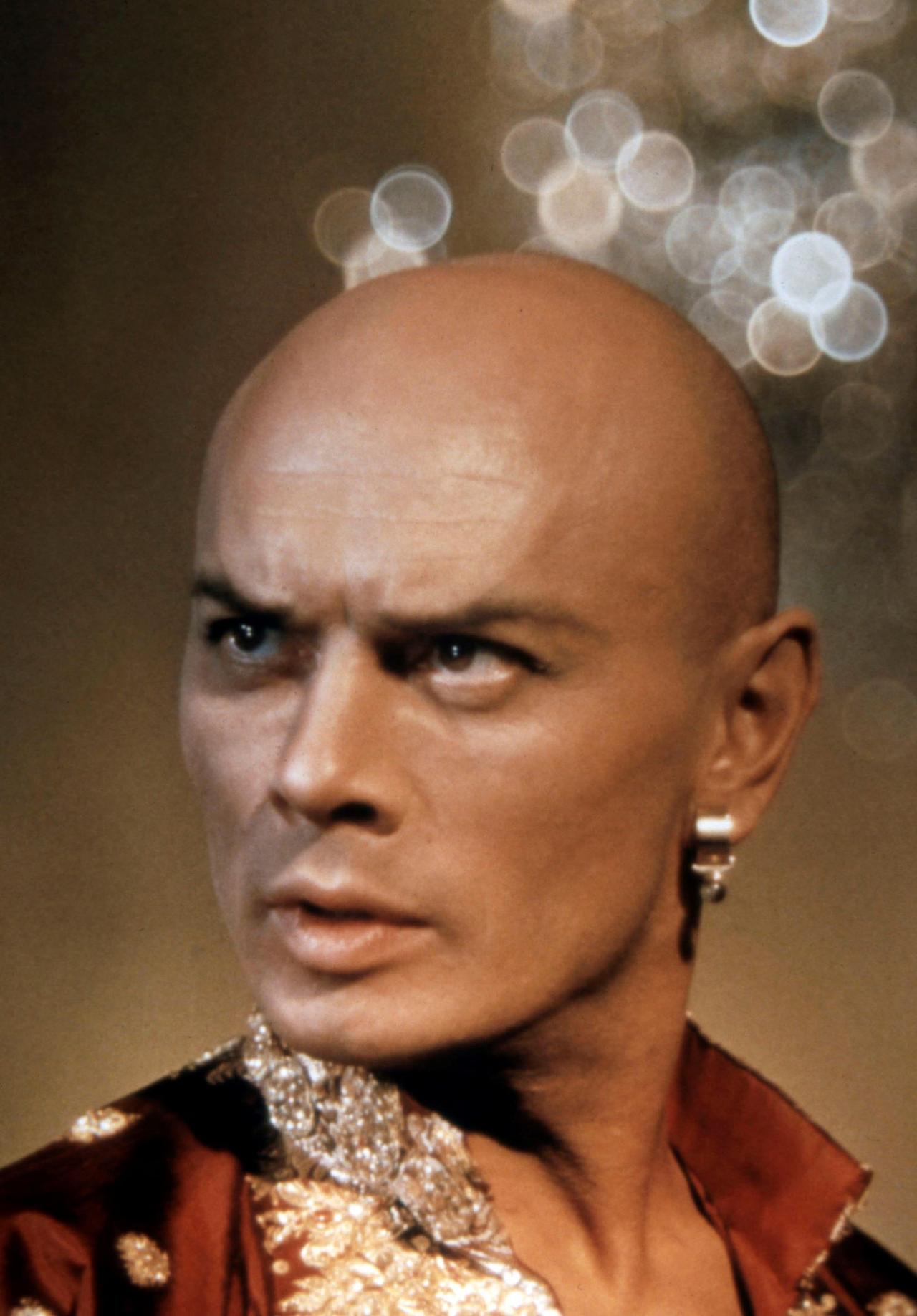 Yul Brynner dans son rôle phare, "Le Roi et moi". [Collection ChristopheL via AFP - © Twentieth Century Fox]