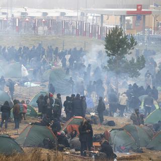 Les migrants sont bloqués à la frontière polonaise. [BelTA/AP/Keystone - Leonid Shcheglov]