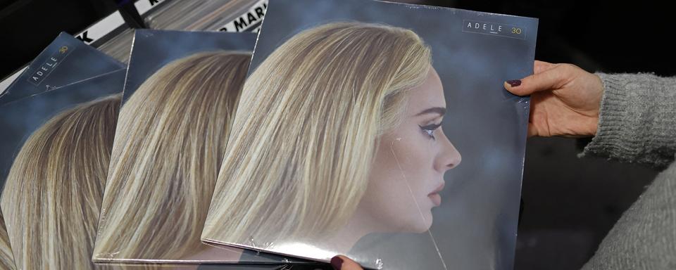 L'album "30" d'Adele disponible dans le magasin Sister Ray record à Londres le 19 novembre 2021.
Tolga Akmen
AFP [Tolga Akmen]