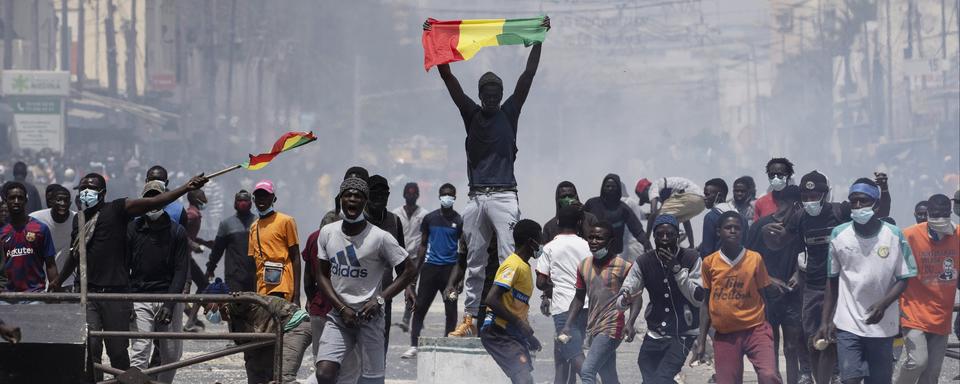 Sénégal : Pillages et émeutes cristallisent la crise politique. [AP via Keystone - Leo Correa]