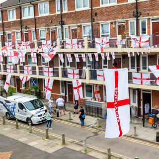 Un quartier de Londres décoré au couleur de l'Angleterre avant la finale de l'Euro 2020. [EPA/Keystone - Vickie Flores]