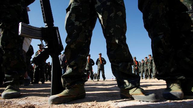 Membres des rebelles birmans de la Shan State Army photographiés en 2012. [Reuters - Chaiwat Subprasom]