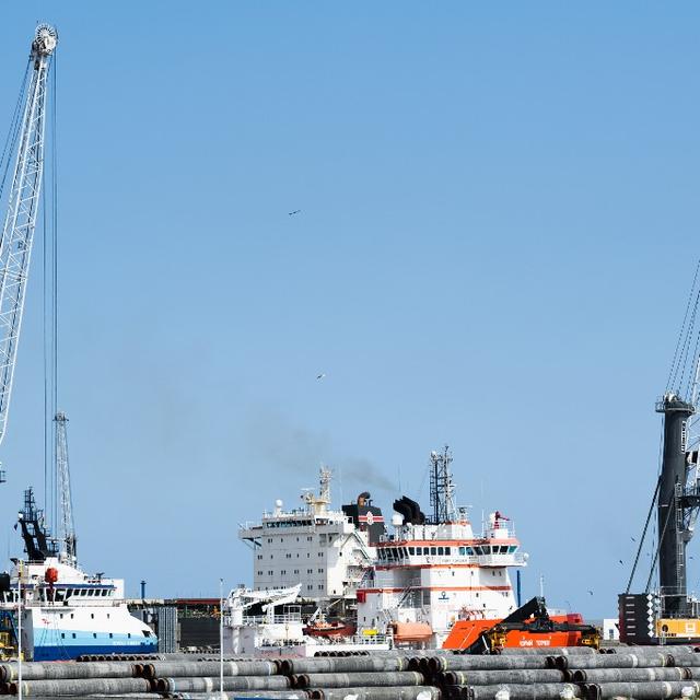 Des tuyaux pour le gazoduc Nord Stream 2 sont entreposés au port de Mukran, sur l'île de Rugen, en Allemagne. [AFP - Dmitrij Leltschuk / Sputnik]