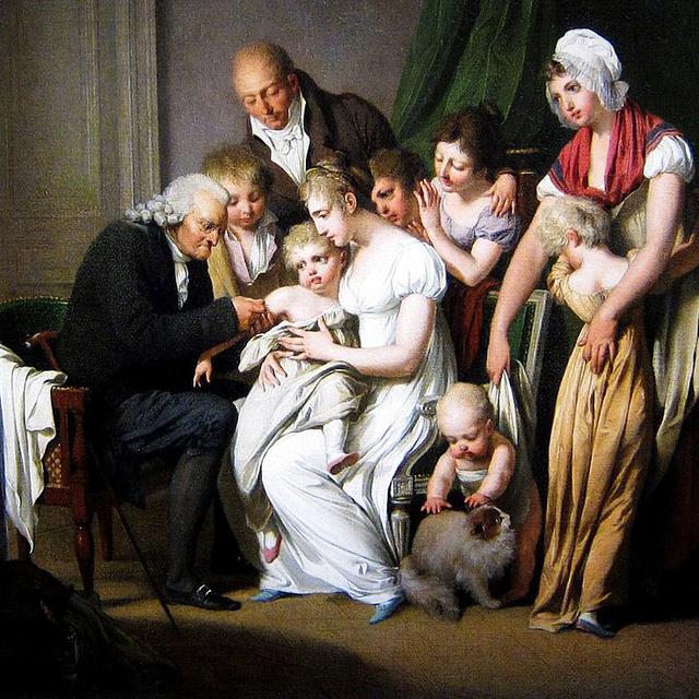 "L'Inoculation", tableau de Louis Léopold Boilly (1807). Dès les années 1770, on immunise les humains de la variole en leur inoculant la variole des vaches. Le mot vaccination vient d'ailleurs du nom de la variole des vaches, la "vaccine", elle-même dérivée du latin "vacca" qui signifie vache.