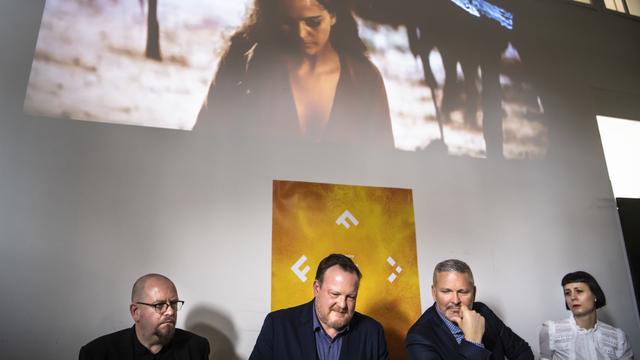 Philippe Clivaz, direction opérationnelle du FIFF, Thierry Jobin, directeur artistique du FIFF, Mathieu Fleury, président du FIFF, et Delphine Niederberger, médiation culturelle (de g. à dr.). [KEYSTONE - JEAN-CHRISTOPHE BOTT]