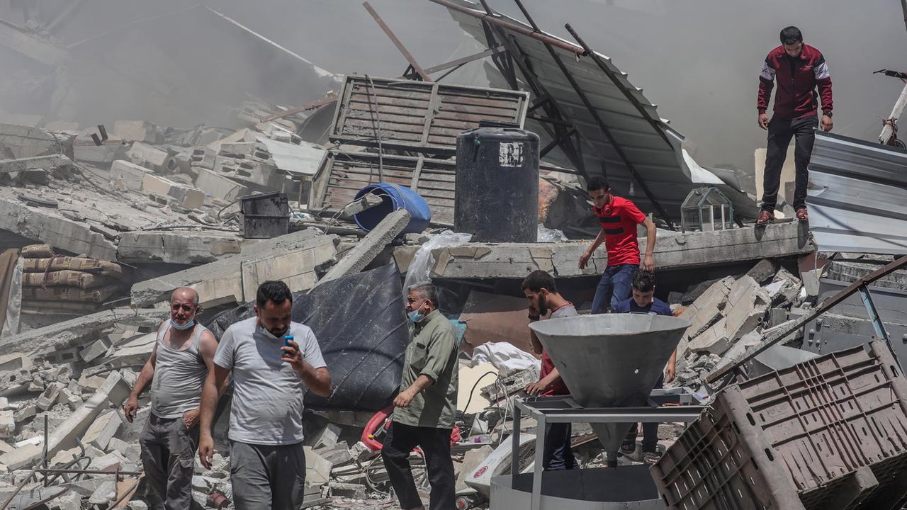 Un bâtiment détruit par les frappes aériennes à Gaza City. [Keystone - EPA/Mohammed Saber]