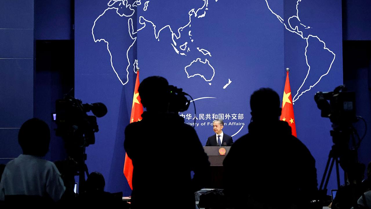 Conférence de presse du ministère chinois des Affaires értangères à Pékin, 14.12.2020. [Reuters - Thomas Peter]