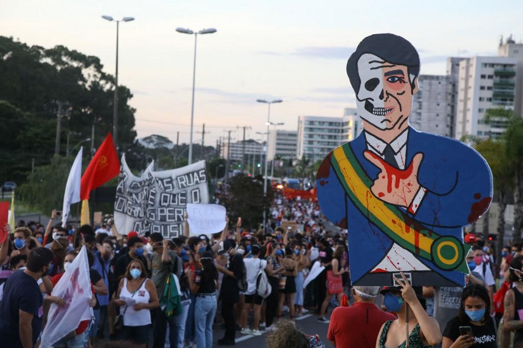 Une manifestation anti-Bolsonaro à Vitoria, au Brésil, le 29 mai 2021. [Gilson Borba/NurPhoto via AFP - Ibrahim Ezzat]
