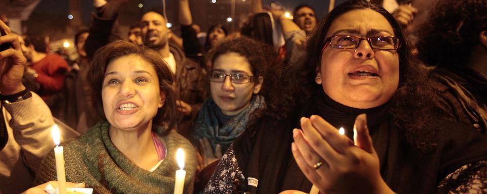 Des Egyptiennes célèbrent la démission du président Hosni Moubarak en 2011 sur la place Tahrir. [Reuters]