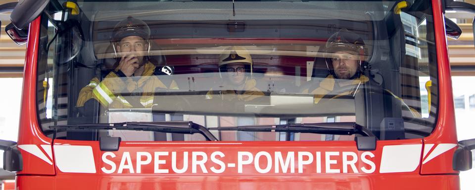 Des pompiers du Service d'incendie et de secours de Genève (image d'illustration). [Keystone - Martial Trezzini]