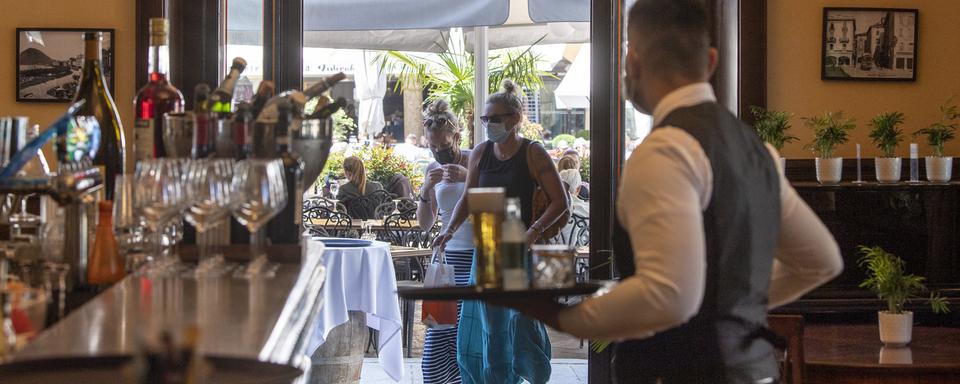 Un restaurant à Lugano. [Keystone - Pablo Gianinazzi/Ti-Press]