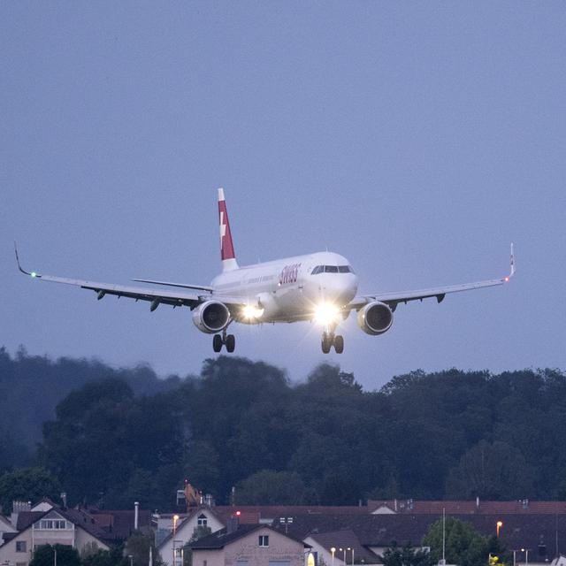 Un avion de Swiss à l'aéroport de Kloten (image d'illustration). [Keystone - Gaetan Bally]